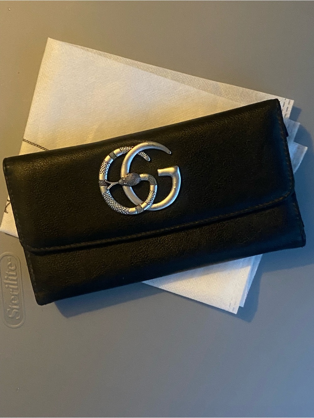 Black Wallet a w/ Interlocking Metal Emblem!